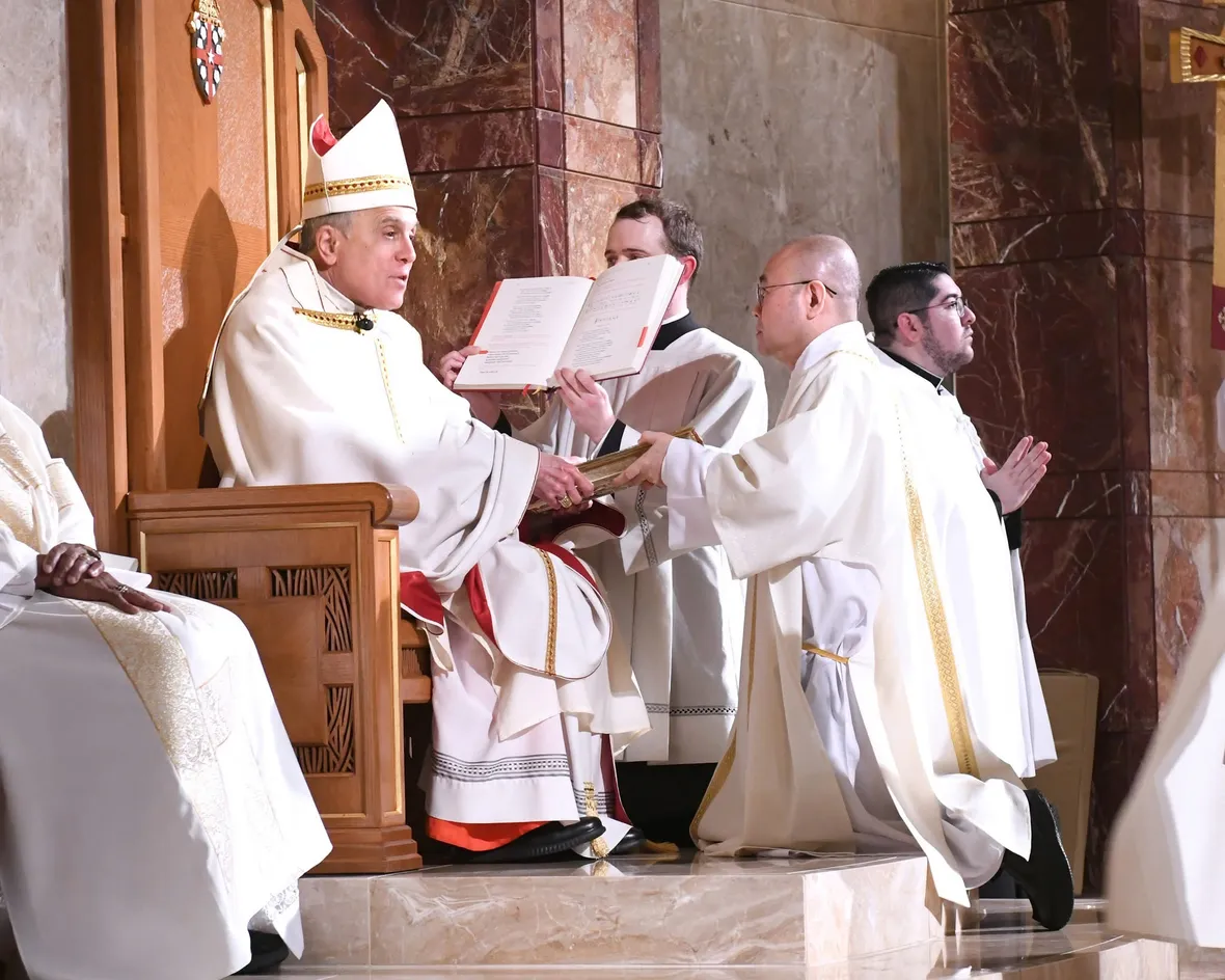 Dcn. Dr. Minh Nguyen being ordained a deacon by Cardinal Daniel DiNardo